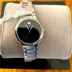 Movado sport watch, tags still attached, never worn in original box